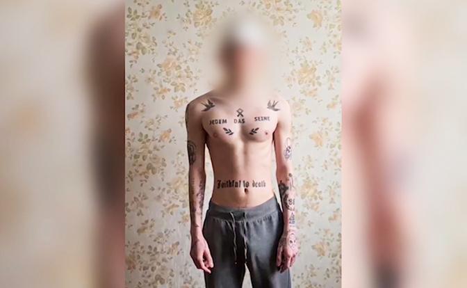 На фото: один из задержанных сторонников украинского молодежного радикального сообщества "М.К.У."