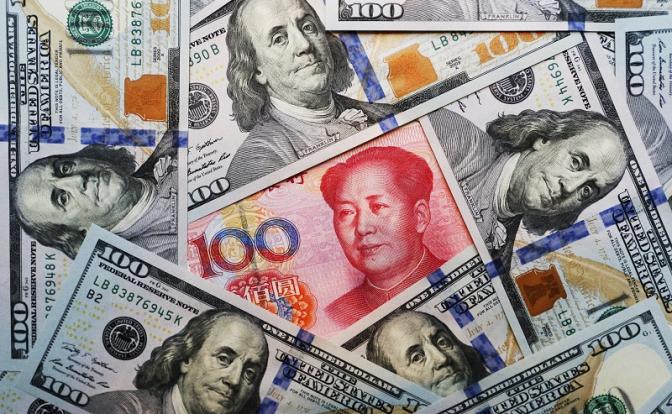 Определен курс доллара, евро и юаня в России