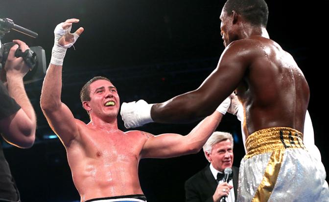 На фото: Никита Иванов и кубинец Хулио Сезар ла Крус (слева направо на первом плане) по окончании заключительного матча групповой стадии Всемирной серии бокса между сборными командами России и Кубы, 2014 год.