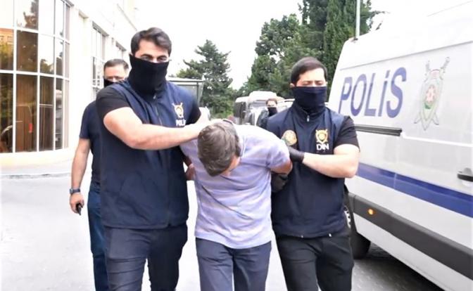 На фото: задержание сотрудника Sputnik Азербайджан в Баку