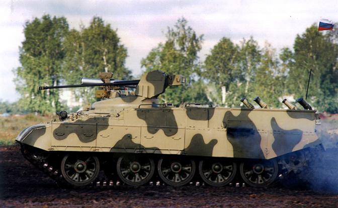 На фото: БТР-Т на шасси танка Т-55.