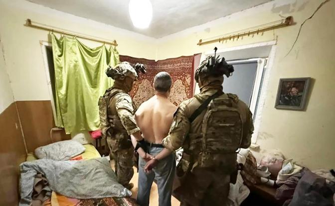 На фото: задержание подозреваемого в убийстве Парубия