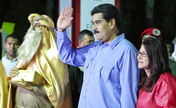 На фото: президент Венесуэлы Николас Мадуро с супругой Силией Флорес.