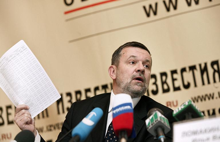 На фото: президент Российского союза автостраховщиков Андрей Кигим во время пресс-конференции, посвященной современному состоянию рынка ОСАГО, 2005