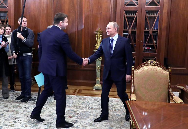 Максим Орешкин, назначенный министром экономического развития РФ и президент России Владимир Путин (слева направо) во время встречи в Кремле, 2016 год