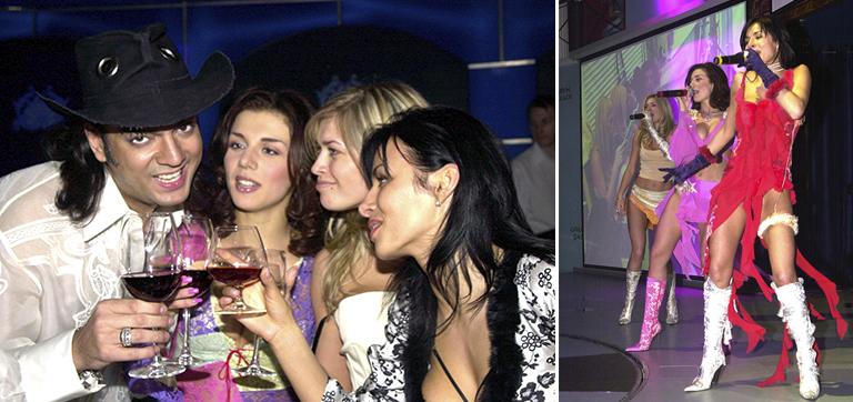 На фото: популярный певец Филипп Киркоров и участницы группы "ВИА Гра" - Анна Седокова, Вера Брежнева и Надежда Грановская (слева направо) - на презентации нового альбома группы, который получил название "Стоп! Снято!", 2003 год